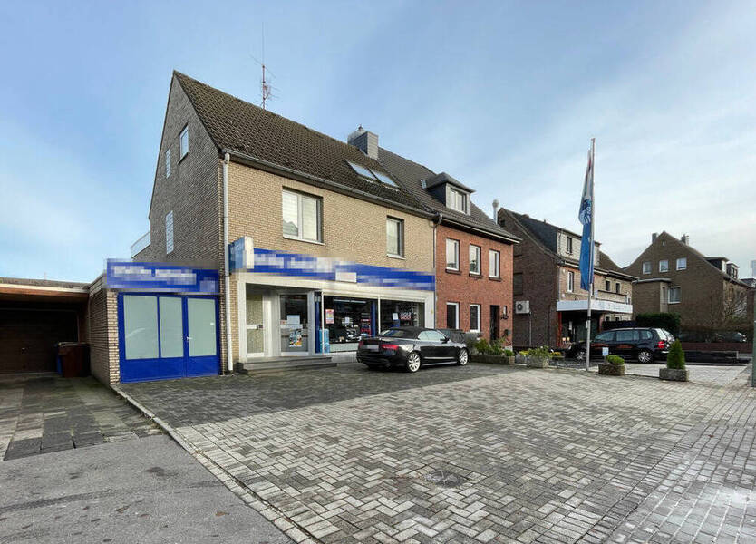 Gepflegtes Wohngeschäftshaus auf schönem Grundstück in belebter Lage