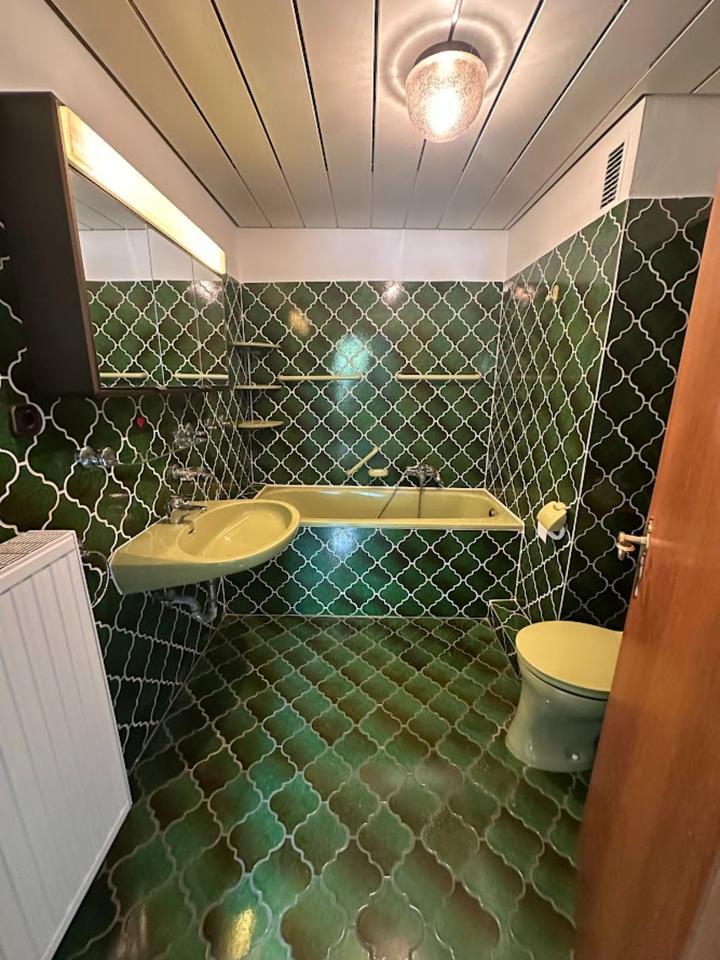 Split-Level Reihenmittelhaus mit Garten und Garage zimmer