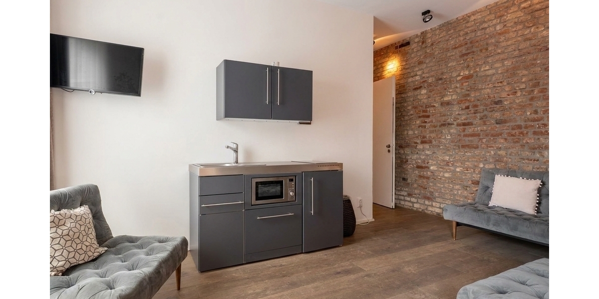 Rund 208.000 EUR Jahresmiete: Wohn- & Geschäftshaus mit Boardinghouse in Köln-Buchforst - Mehrfamilienhaus, Wohnhaus Köln Mülheim | Angebot:27679841