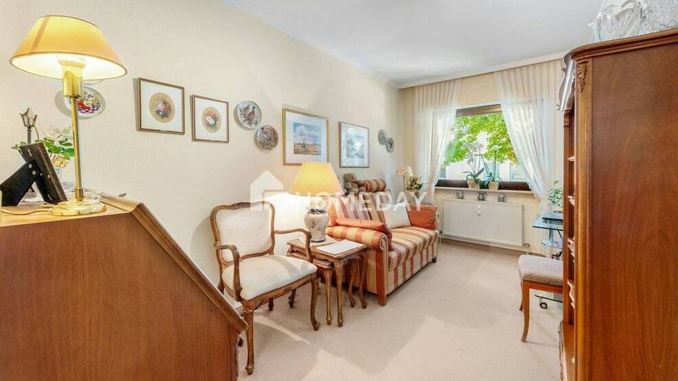 Charmante 3-Zimmer-Eigentumswohnung mit Westbalkon, Gemeinschaftsgarten und Einzelgarage