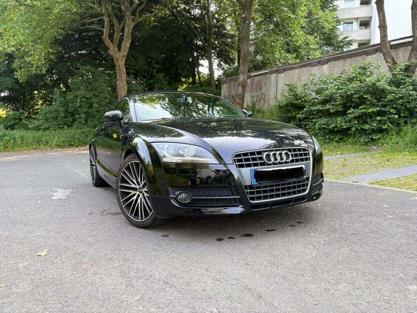TT